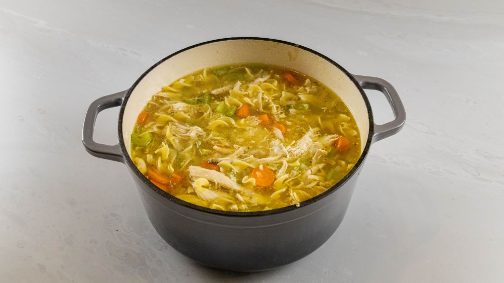 chicken noodle soup in stock pot